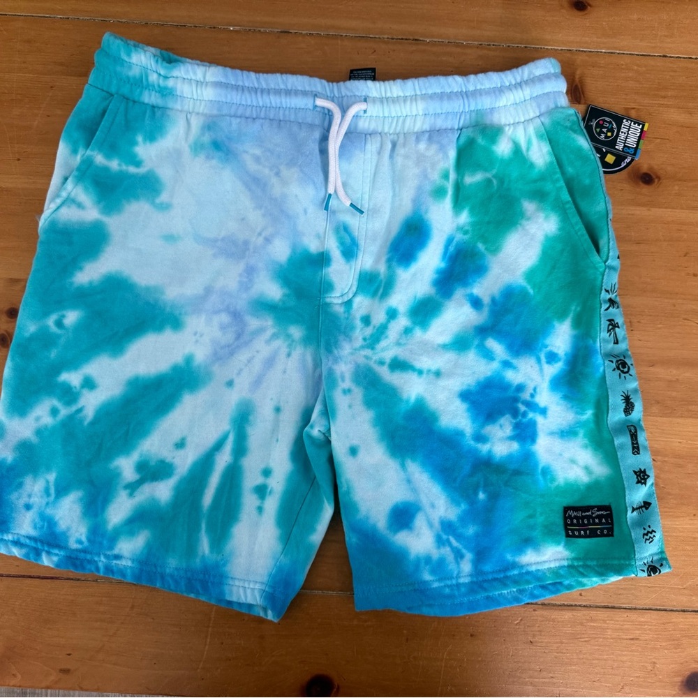 Maui and Sons Blue and White Swim Trunks with Ocean-Inspired Design